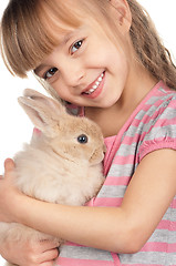 Image showing Little girl with rabbit