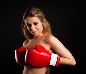 Image showing beautiful nude girl with boxing gloves