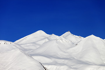 Image showing Snow-white mountains and blue sky