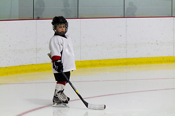 Image showing Little boy playing ice hockey