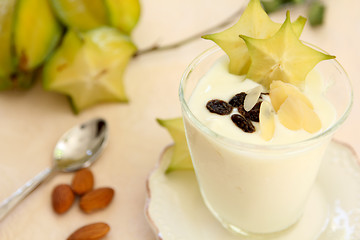 Image showing Yogurt with almond and starfruit