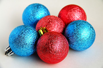 Image showing Red and blue christmas blubs