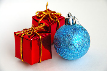 Image showing Christmas gift boxes and bulb