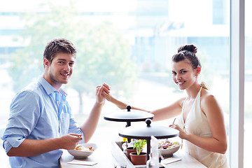 Image showing young couple at luch