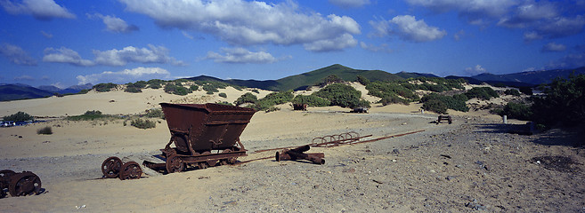 Image showing old mine trolleys on the beach