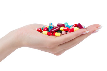 Image showing hand holds pill 