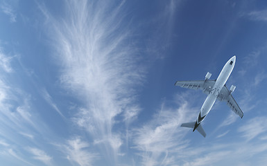 Image showing Passenger aircraft flying in blue sky