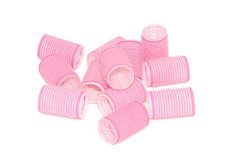 Image showing Twelve pink velcro rollers in a jumbled pile