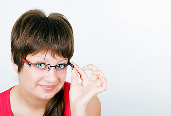 Image showing beautiful blue eyed young smiling girl in glasses