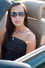 Image showing Brunette woman in car