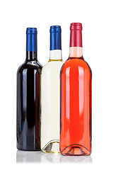 Image showing Three bottles of wine isolated on white 