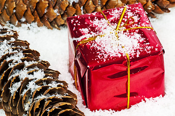 Image showing christmas gift in snow