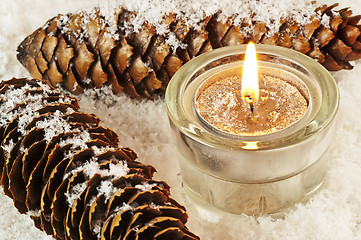 Image showing candle in snow