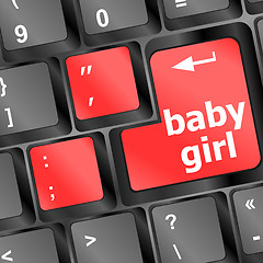 Image showing Baby girl key on laptop keyboard