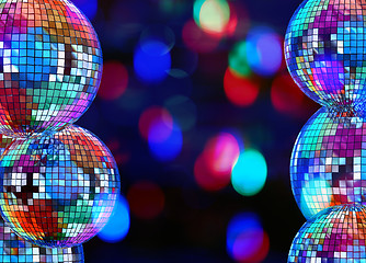 Image showing Colorful dark background with mirror disco balls