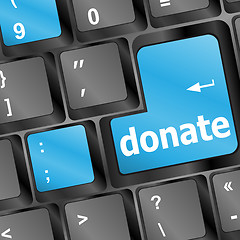 Image showing donate key word on computer keyboard