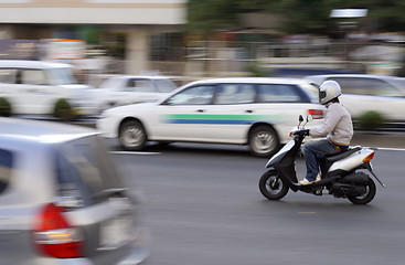 Image showing Scooter in traffic