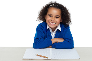 Image showing Enthusiastic student paying attention in the class