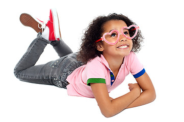 Image showing Young girl wearing funny heart shaped frame