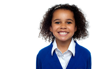 Image showing Profile shot of a cool and confident school girl