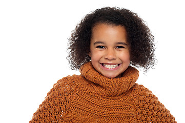 Image showing Snap shot of a stylish african girl in winter clothes