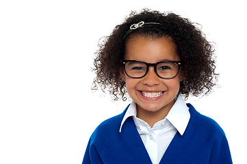 Image showing Bespectacled primary girl on a white background