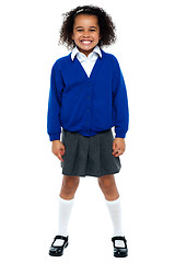 Image showing Full length portrait of a joyous African school girl