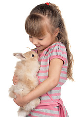 Image showing Little girl with rabbit