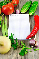 Image showing Notebook with vegetables and pepper