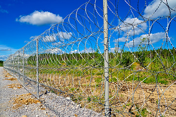 Image showing Barbed wire fence