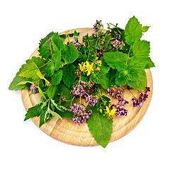 Image showing Herbs on a round board