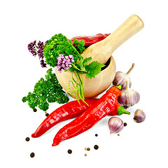 Image showing Herbs and spices in a mortar