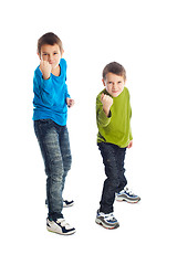 Image showing Two boys in a fighting stance.