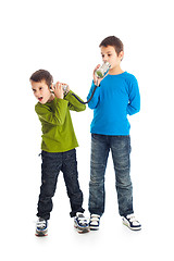 Image showing  Two boys calling tin can phone.