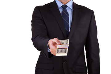 Image showing businessman holding large sum of cash