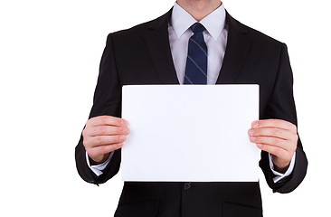 Image showing business man holding blank note card