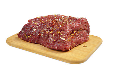Image showing Beef with spices on board