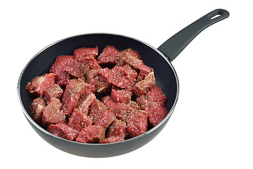 Image showing Raw meat in pan.