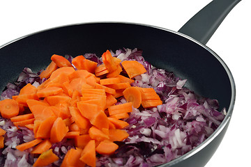 Image showing Onions and carrots in pan