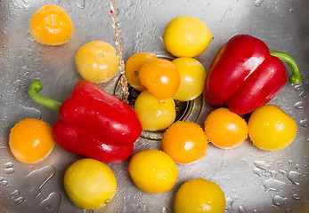 Image showing Washing bright fruits and vegetables