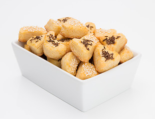 Image showing Cheese cookies with cumin and sesame on white background