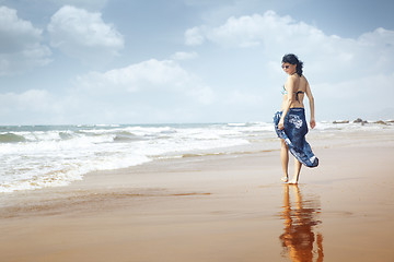 Image showing Walking at the beach