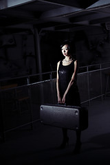 Image showing Woman with suitcase