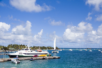 Image showing harbor port  jetty hotel passenger ferry and yacht sailboats Cli