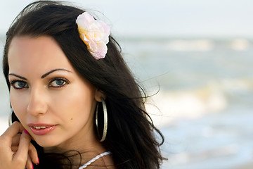 Image showing lovely young woman on the beach