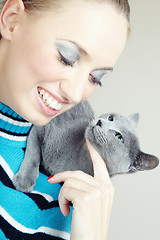 Image showing Pampering cat