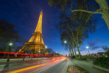 Image showing Wonderful colors of Eiffel Tower. Winter sunset with car light t