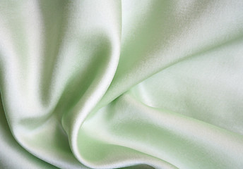 Image showing Smooth elegant green silk as background