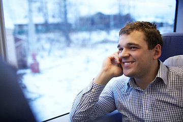 Image showing Young man in the train.