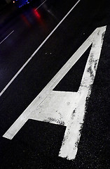 Image showing Sign on asphalt